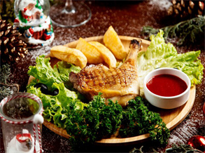 Grilled chicken thighs with potatoes and lettuce