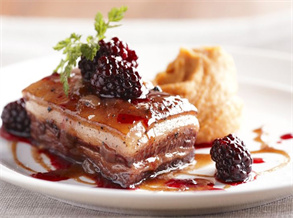 Roasted pork belly with blackberry sauce and mashed potatoes