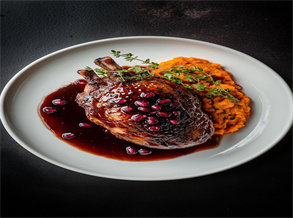 Duck Legs Braised in Pomegranate Juice